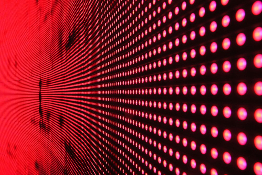 structure-light-led-movement-158826-158826 Vibrant abstract pattern of illuminated red LED lights forming a dynamic design.